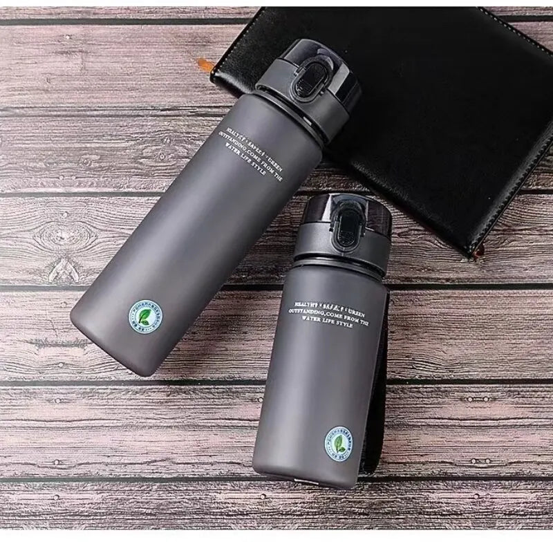 Leak-Proof Sports Water Bottle - BPA-Free 400ml/560ml Portable Bottle for Hiking & Travel