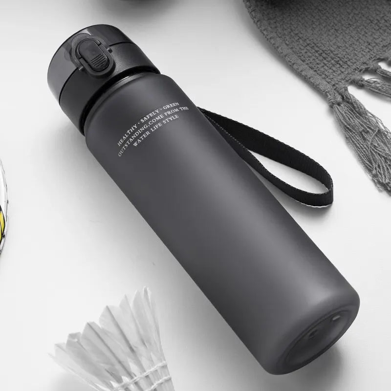 Leak-Proof Sports Water Bottle - BPA-Free 400ml/560ml Portable Bottle for Hiking & Travel